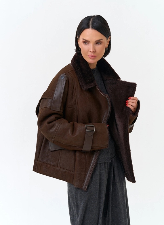 Женская дубленка из натурального меха фото